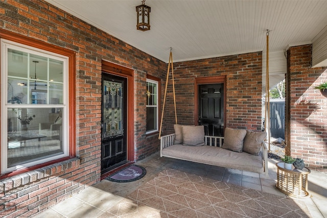 property entrance featuring a porch