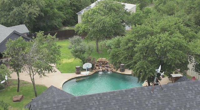 view of pool with a yard and a patio area