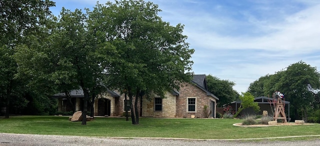 view of front of property with a front lawn