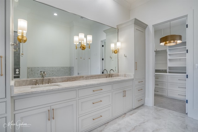 bathroom featuring vanity and ornamental molding