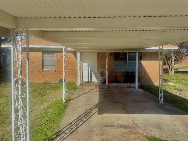 view of patio / terrace featuring a carport