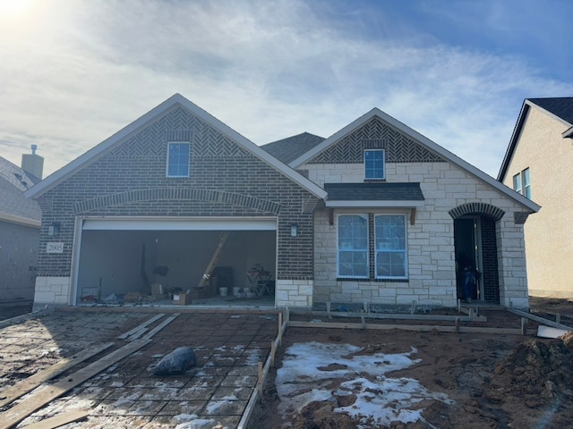 view of front of home with a garage