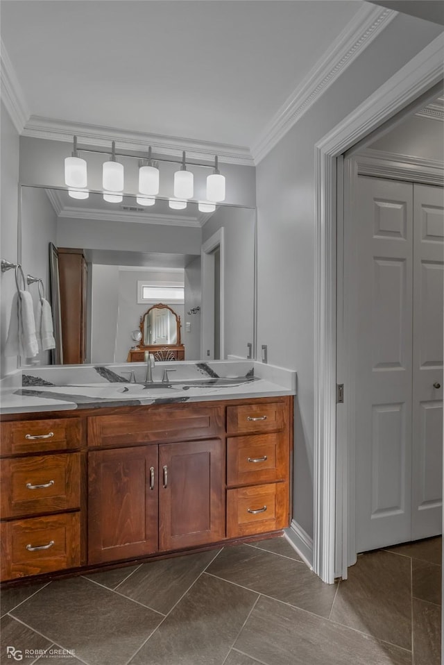 bathroom with vanity and crown molding