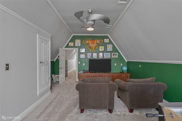 living room with lofted ceiling, light colored carpet, ceiling fan, and crown molding