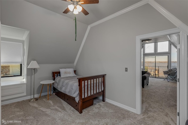 bedroom with ceiling fan, crown molding, light carpet, and lofted ceiling