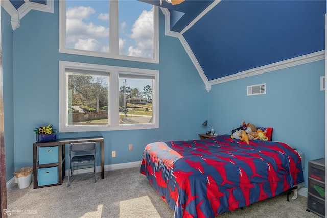 bedroom with carpet floors, crown molding, and high vaulted ceiling