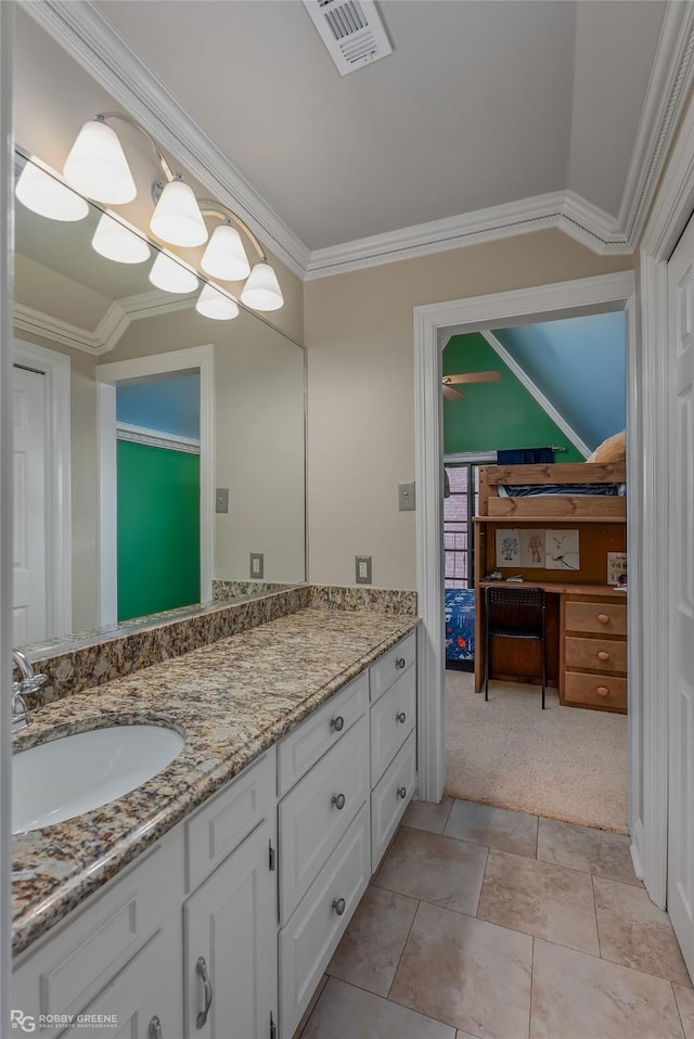 bathroom featuring vanity and crown molding