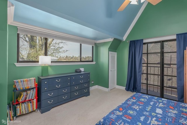 carpeted bedroom with ceiling fan, crown molding, and lofted ceiling