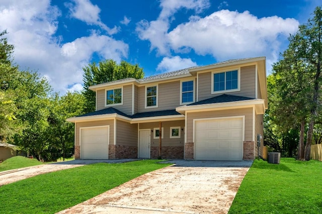 view of front of property featuring central AC, a garage, and a front yard