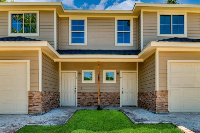 property entrance with a garage