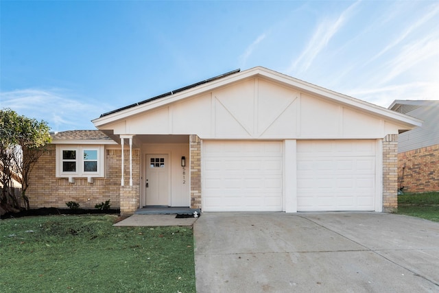 ranch-style home with a garage