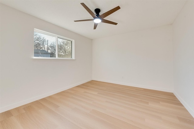 spare room with ceiling fan and light hardwood / wood-style flooring