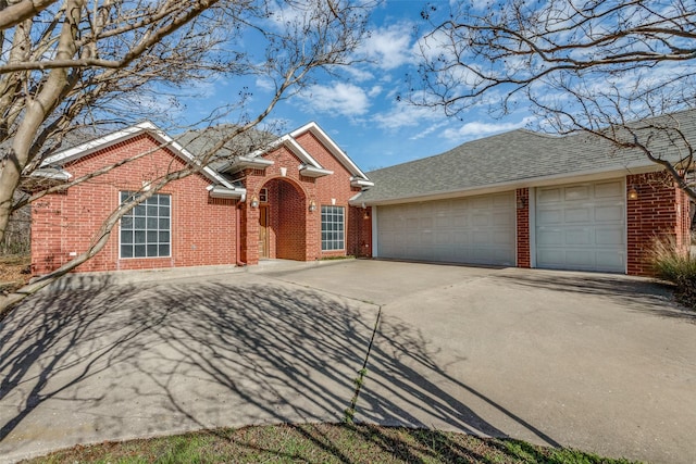 view of front of property with a garage