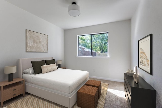 bedroom featuring light carpet