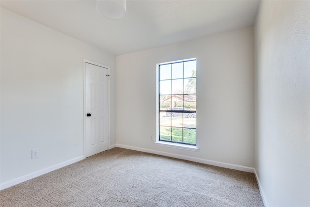 empty room featuring carpet flooring