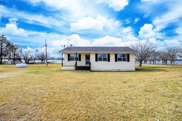 view of front of house with a front yard