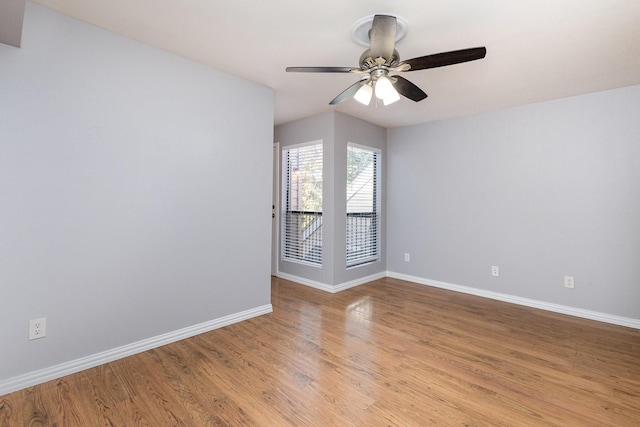 unfurnished room featuring light hardwood / wood-style flooring and ceiling fan