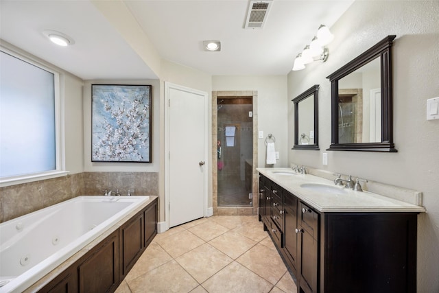 bathroom with vanity, separate shower and tub, and tile patterned floors