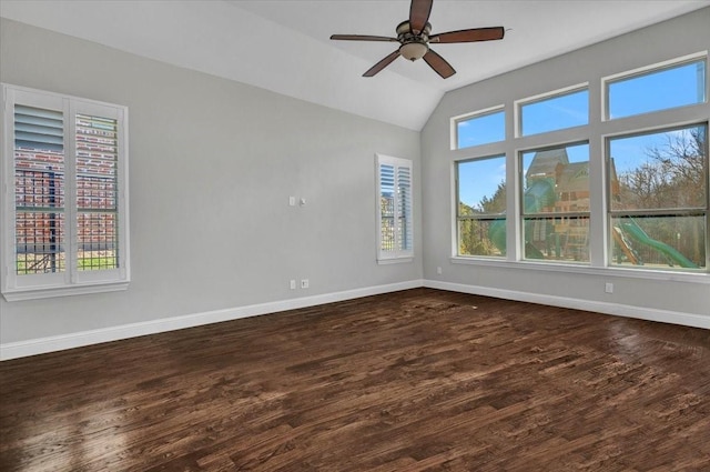 unfurnished room featuring ceiling fan, dark hardwood / wood-style flooring, and lofted ceiling