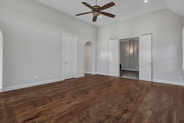 unfurnished bedroom featuring ceiling fan and dark hardwood / wood-style floors