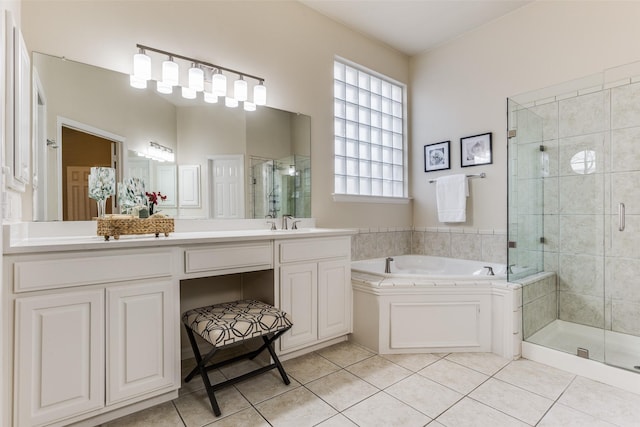 bathroom featuring tile patterned flooring, vanity, and independent shower and bath