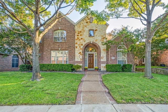 view of front of property with a front lawn