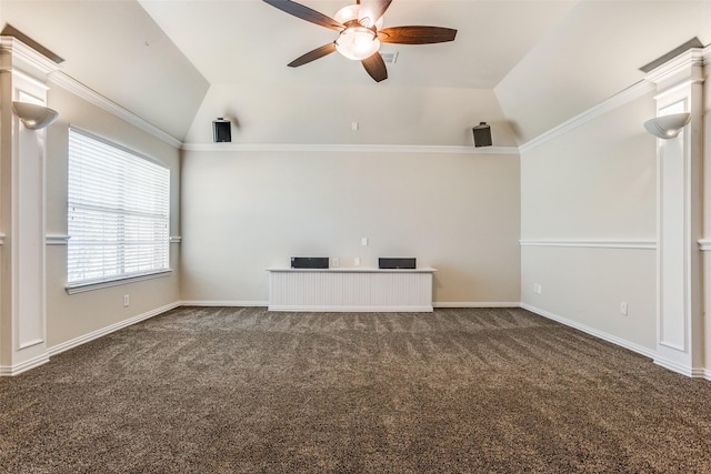 unfurnished living room featuring lofted ceiling, dark carpet, ornamental molding, and ceiling fan