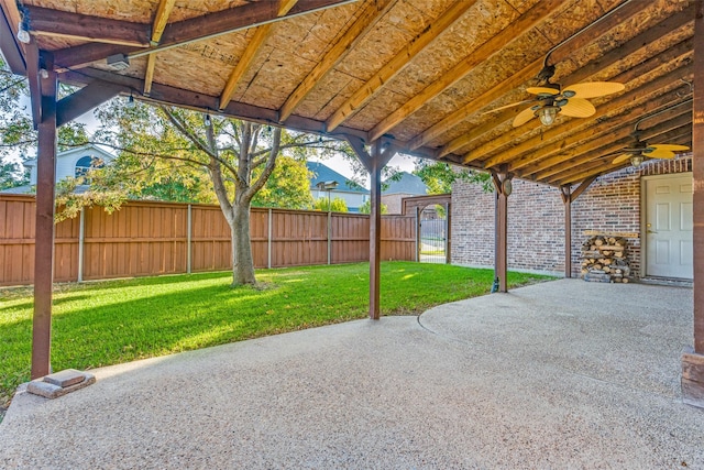 view of patio featuring ceiling fan