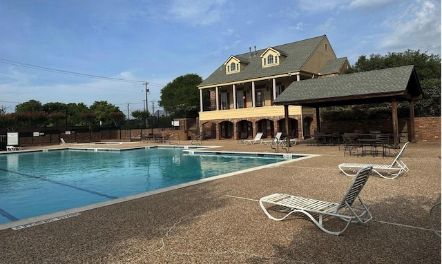 view of pool featuring a gazebo and a patio area