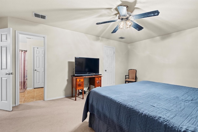 bedroom with baseboards, ceiling fan, visible vents, and light colored carpet