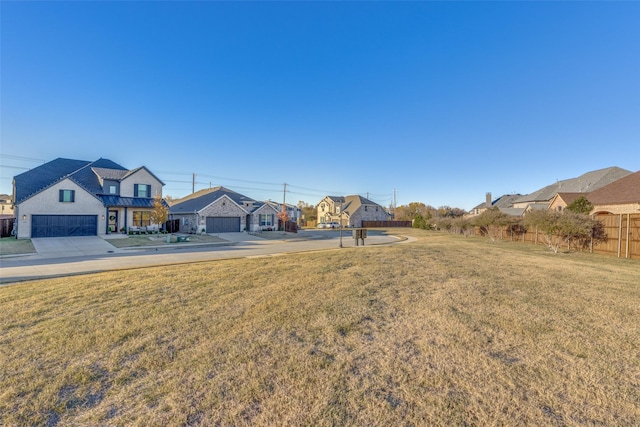 view of yard with a garage