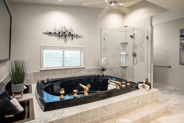 bathroom with shower with separate bathtub and ceiling fan