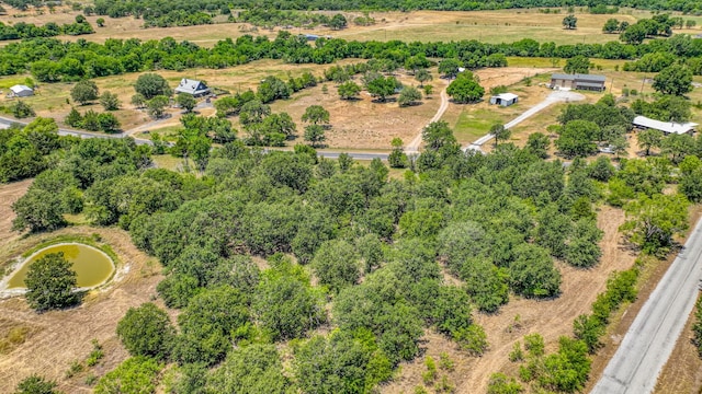 aerial view with a water view and a rural view