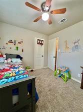 game room featuring carpet floors and ceiling fan