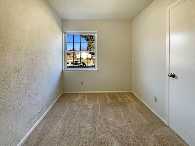 spare room with carpet floors