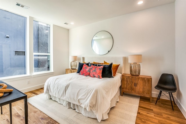 bedroom featuring wood-type flooring