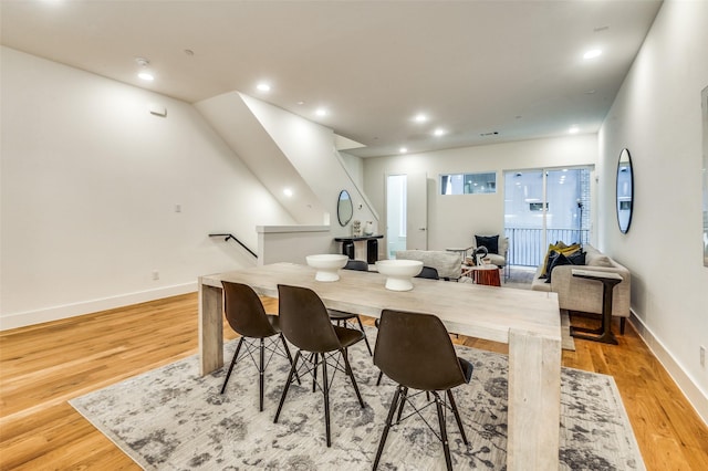 dining space featuring light hardwood / wood-style floors