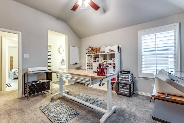 office featuring carpet floors, vaulted ceiling, and ceiling fan