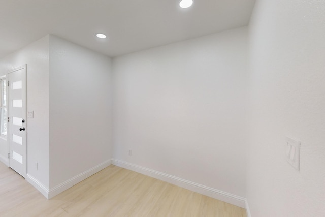 empty room with light hardwood / wood-style floors