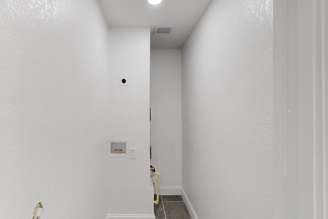 laundry room featuring tile patterned flooring, hookup for an electric dryer, and hookup for a washing machine