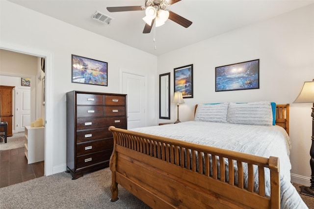 bedroom featuring carpet, a closet, and ceiling fan