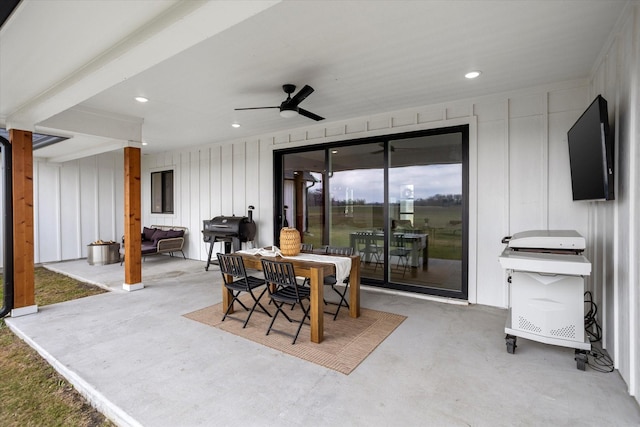 view of patio with ceiling fan and grilling area