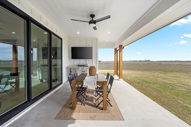 view of patio / terrace featuring ceiling fan