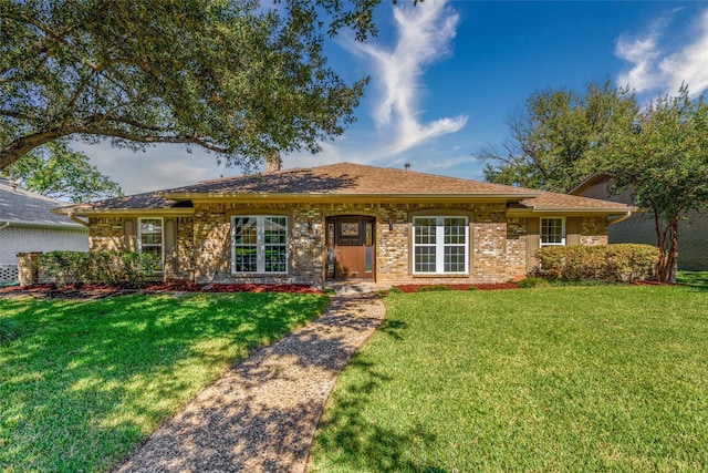 ranch-style house featuring a front lawn