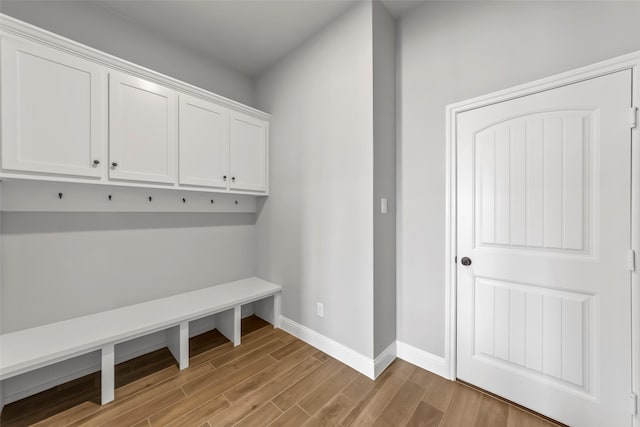 mudroom with light hardwood / wood-style flooring