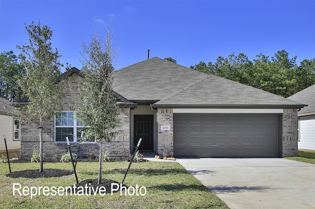 ranch-style home featuring a front lawn and a garage