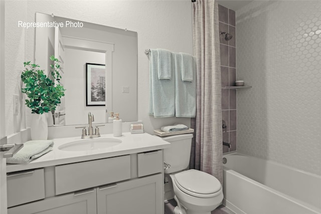 full bathroom with vanity, toilet, and shower / bath combo with shower curtain