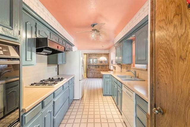 kitchen featuring sink, white appliances, light tile patterned floors, ceiling fan, and range hood