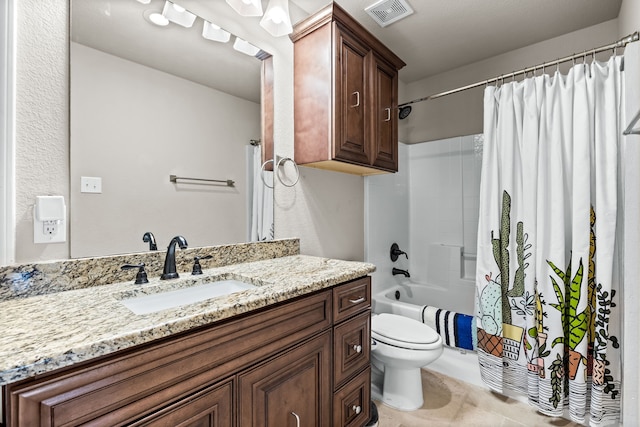 full bathroom featuring shower / bathtub combination with curtain, vanity, and toilet