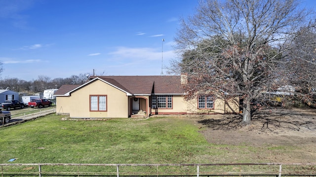 view of front of house with a front yard